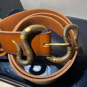 Authentic Gucci Leather belt with snake buckle.